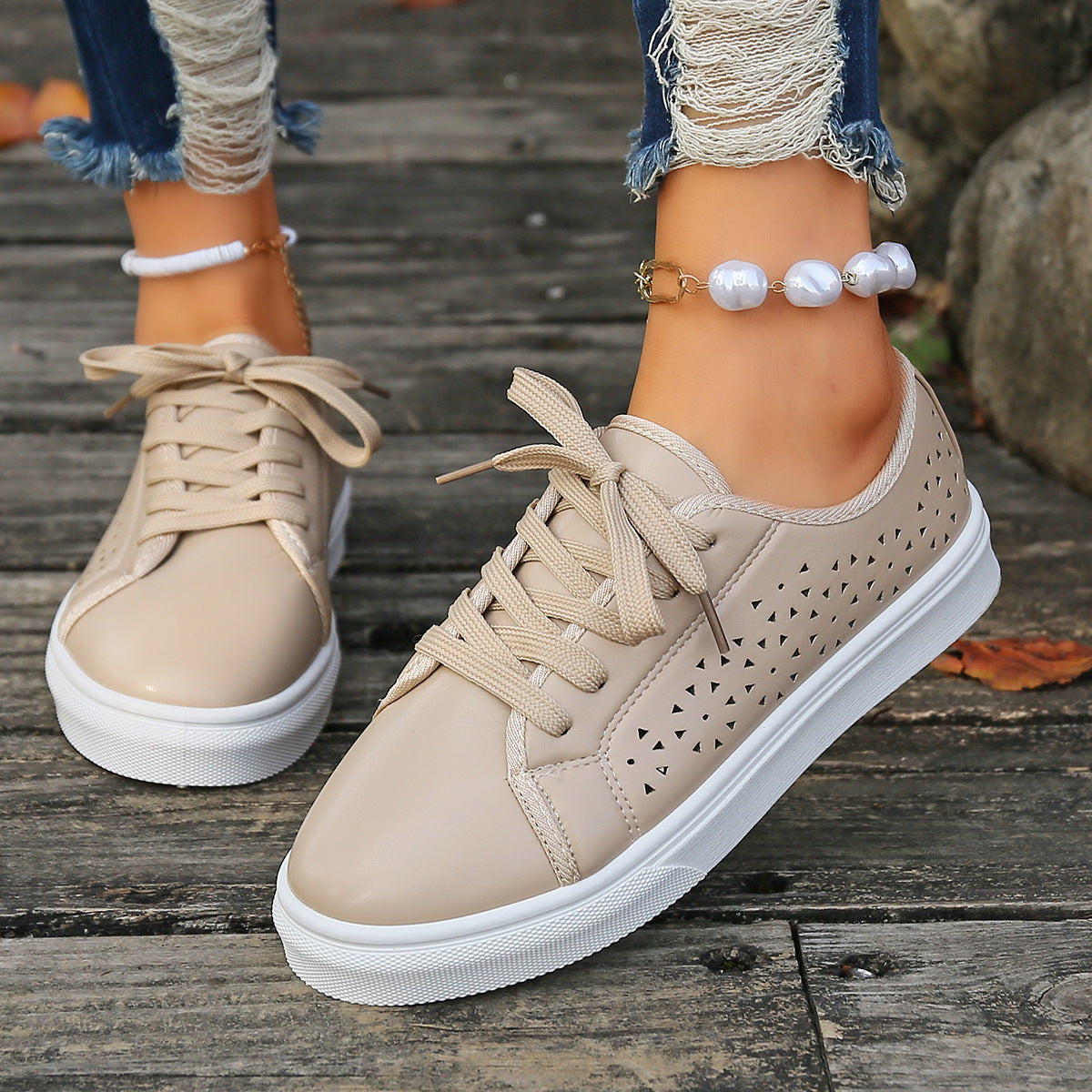 Elegante en gedetailleerde ondersteunende sneakers