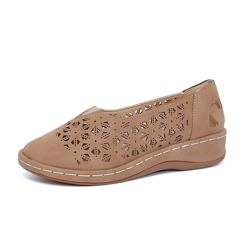 Elegante Slip-on Loafers met Hol Patroon