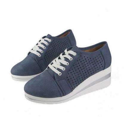 Ademende sleehak sneakers