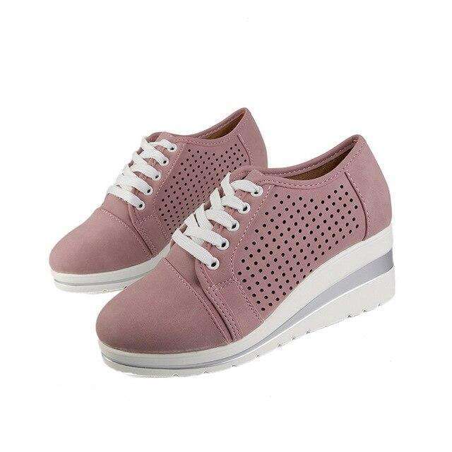 Ademende sleehak sneakers